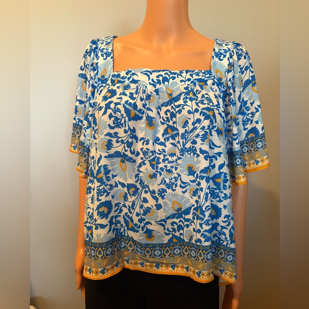 Flying Tomato Blue and White Floral Blouse with yellow accents.
